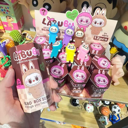 Mini figura decorativa sorpresa celular